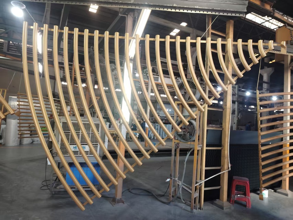 Aluminum panels prepared for final curing after spray coating