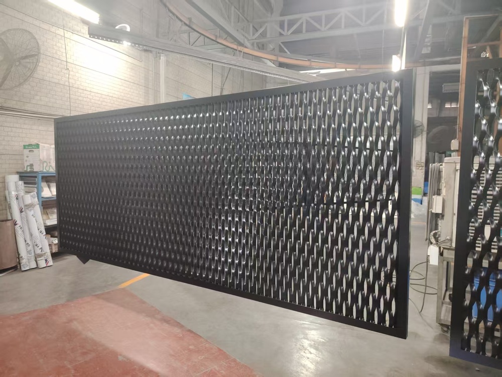 Surface finishing of aluminum facade panels in Wallnova workshop