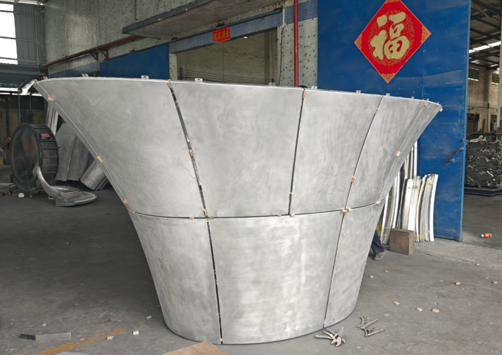 Double curved aluminum panel custom fabrication by WALLNOVA